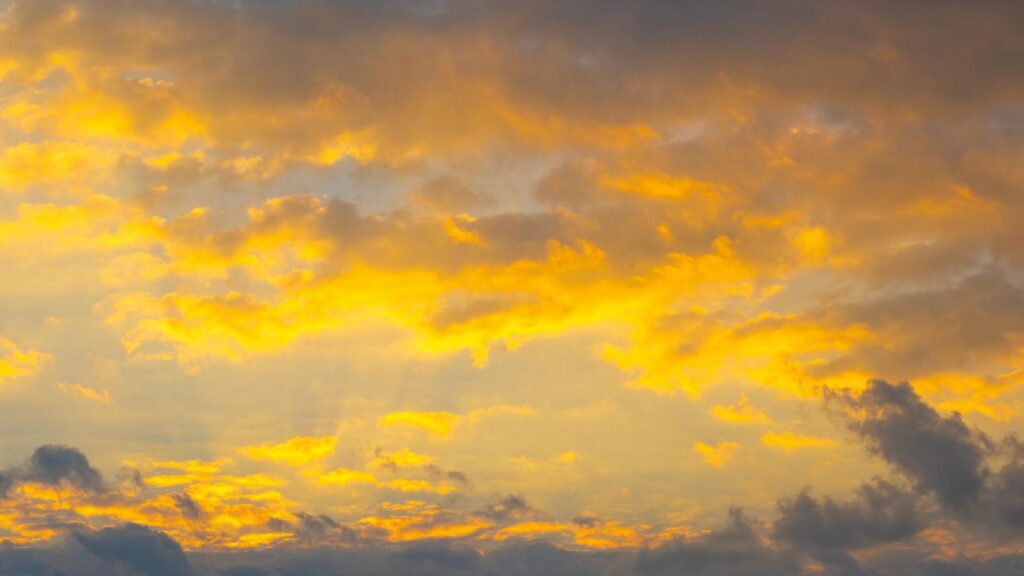 Dramatic golden clouds fine art photography by Layne Morgan
