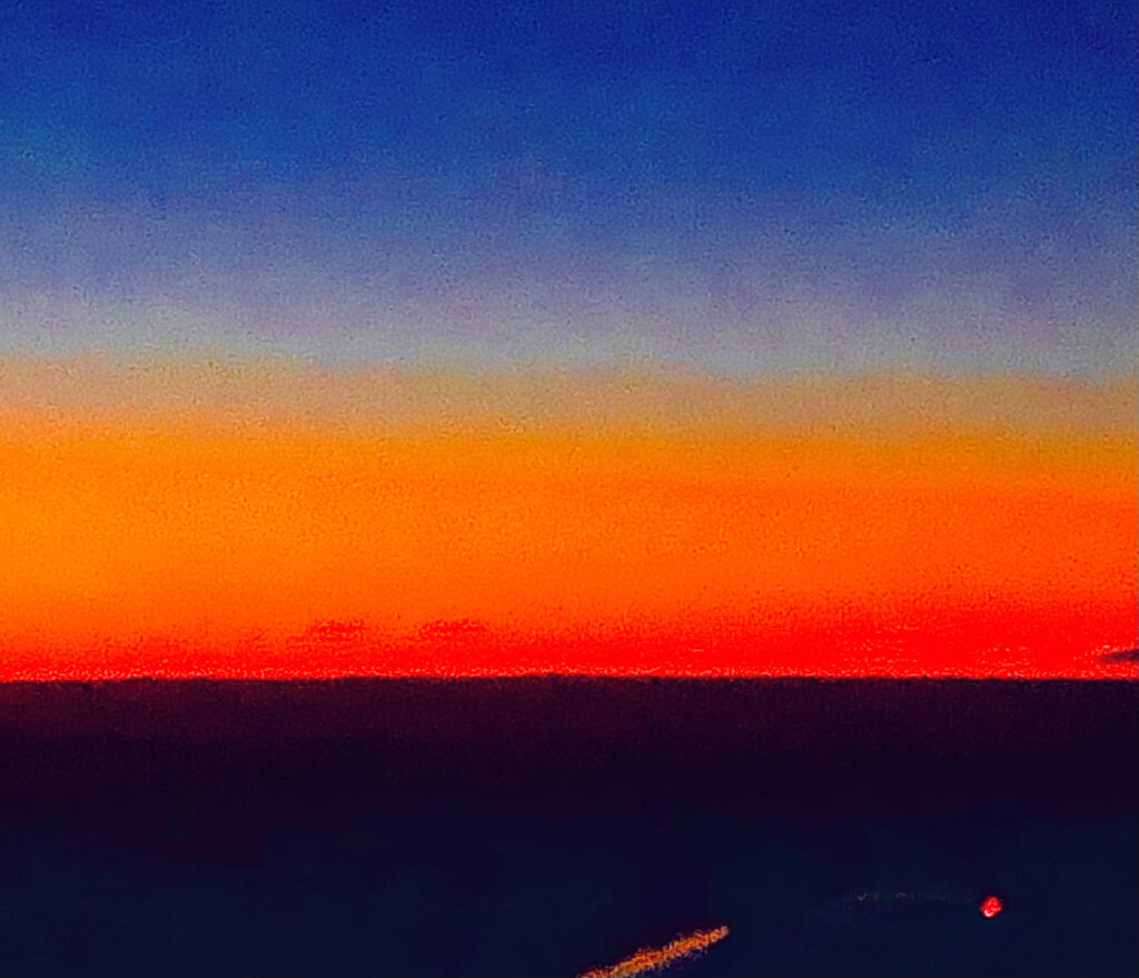 Abstract sunset horizon gradient with orange, red, and blue tones, contemporary digital art by Layne Morgan