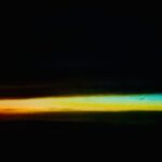 Abstract horizon gradient with vibrant orange, yellow, and blue tones, contemporary digital art by Layne Morgan