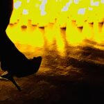 Warm glowing yellow light with dark silhouette, abstract atmospheric digital art by Layne Morgan