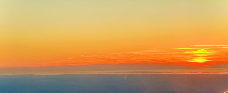 Golden sunset horizon over calm ocean sky – fine art atmospheric photography by Layne Morgan
