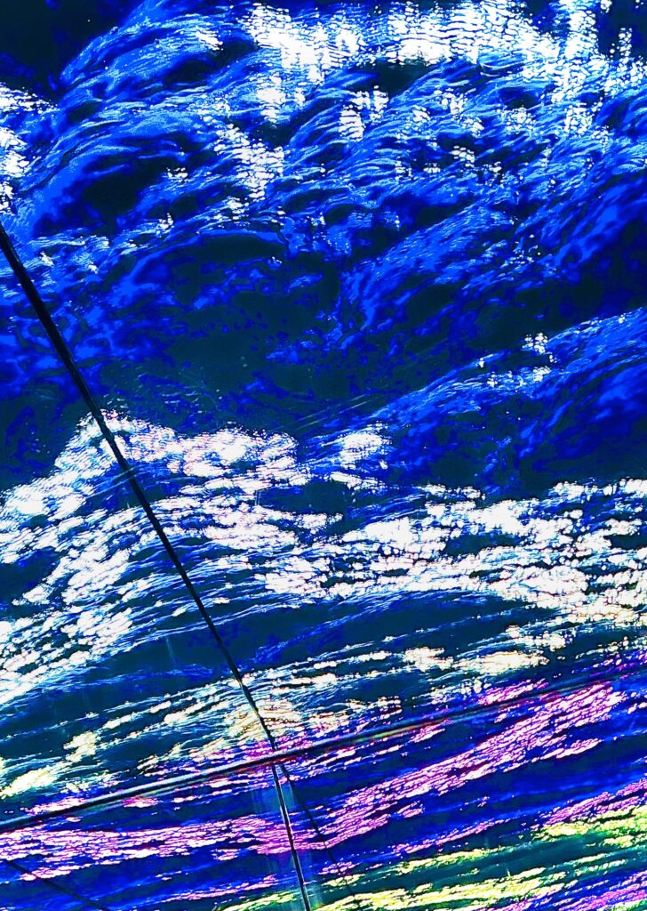 Abstract blue wave patterns with flowing water textures, contemporary digital art by Layne Morgan