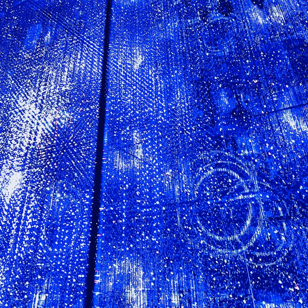 Textured blue abstract with vertical light patterns, contemporary digital art by Layne Morgan