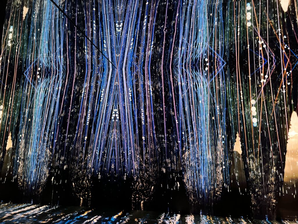 Abstract vertical light streaks resembling forest or rain, contemporary digital art by Layne Morgan