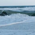 Layne Morgan fine art photography – ocean waves rolling along a shoreline