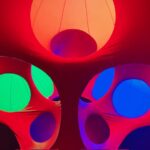 Abstract light painting with vibrant red, blue, and green circles created in-camera by fine art photographer Layne Morgan, selected for the Madison Avenue Art Show