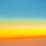 Minimalist color gradient horizon with blue, yellow and orange tones – abstract fine art photography by Layne Morgan