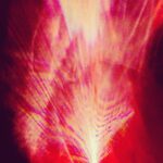 Abstract red light energy resembling flame motion – experimental light photography by Layne Morgan