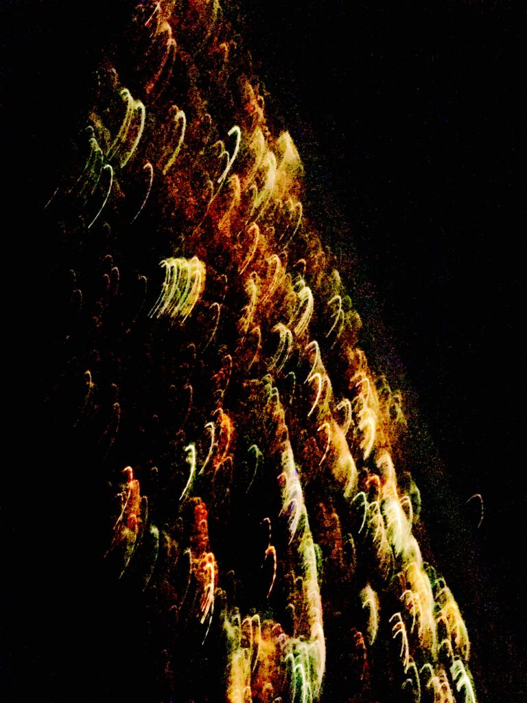 Golden light sparks captured with long exposure photography – abstract Painting With Light by Layne Morgan