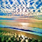 Ripple cloud pattern over coastal sunset sky – fine art sky photography by Layne Morgan