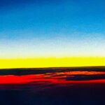 Abstract color horizon with blue sky, yellow light and red foreground – fine art photography by Layne Morgan