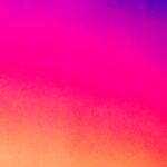 Abstract pink and orange light gradient with soft atmospheric glow