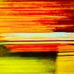 Abstract color field photograph with streaks of red, orange, and yellow light over a glowing horizon by Layne Morgan