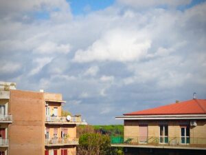 Colorful Mediterranean coastal buildings under blue sky fine art architectural photography by Layne Morgan