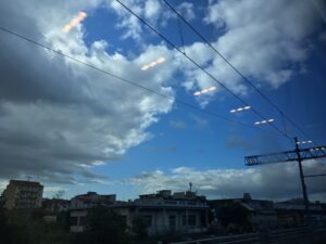 Urban skyline beneath dramatic clouds cityscape fine art architecture photography by Layne Morgan