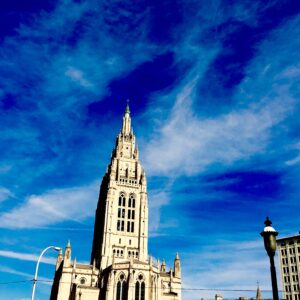 Historic church tower rising into deep blue sky architectural fine art photography by Layne Morgan